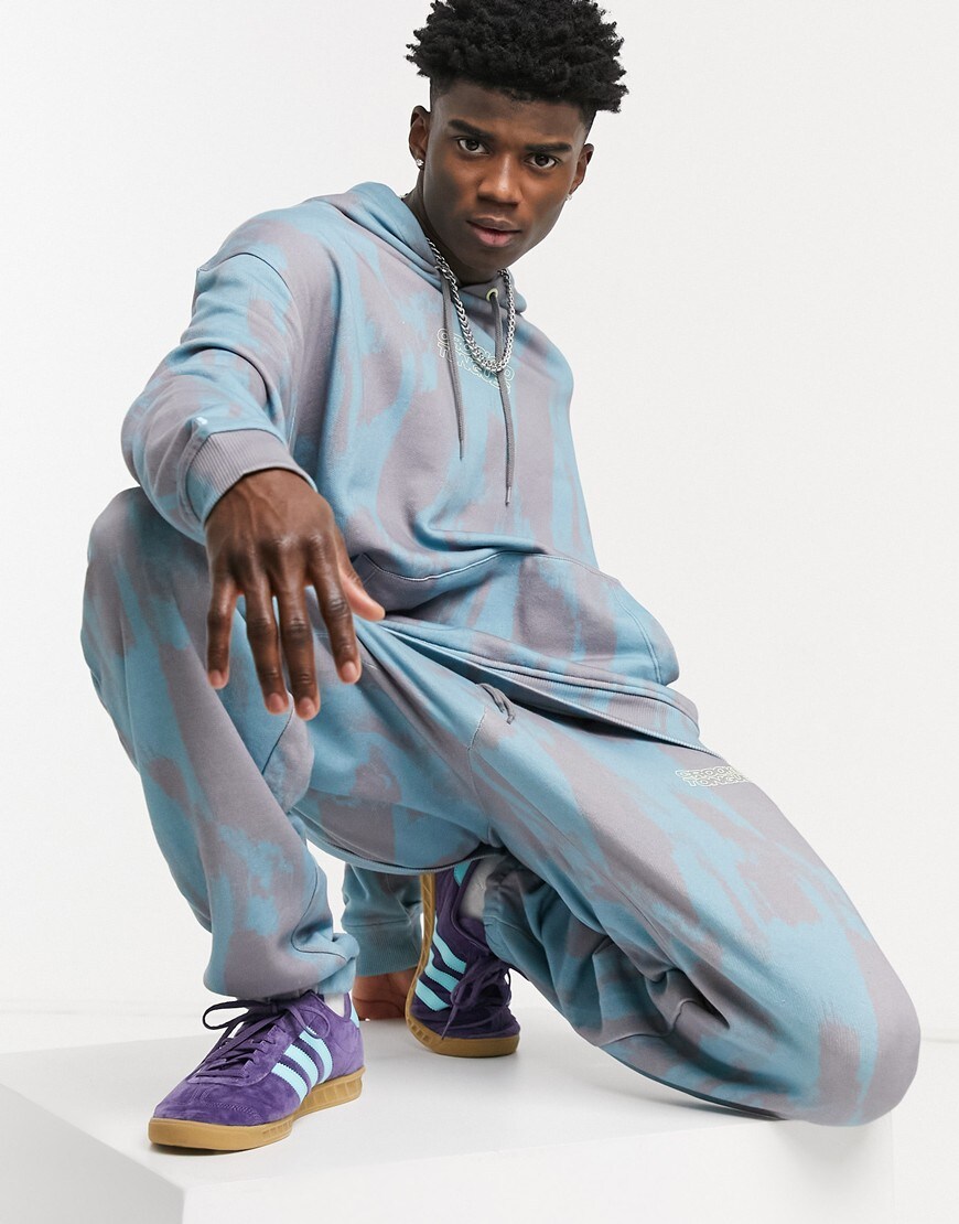 An image of a man wearing a tracksuit by Crooked Tongues | ASOS Style Feed