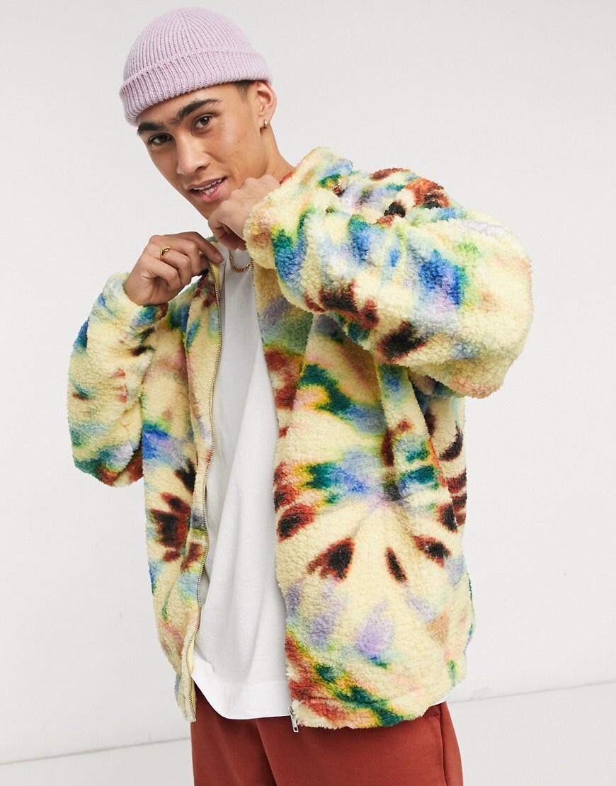 An image of a man wearing a multi colour borg jacket by ASOS Design | ASOS Style Feed