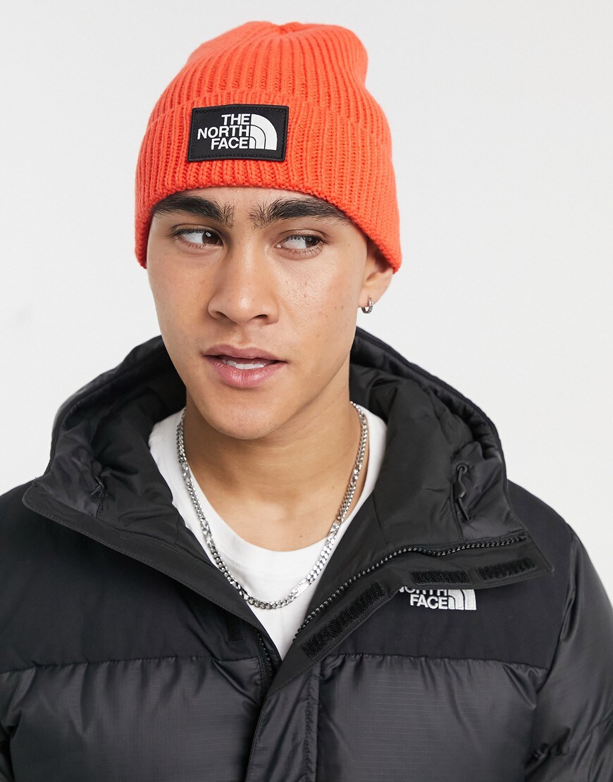 An image of a man wearing an orange beanie by The North Face | ASOS Style Feed