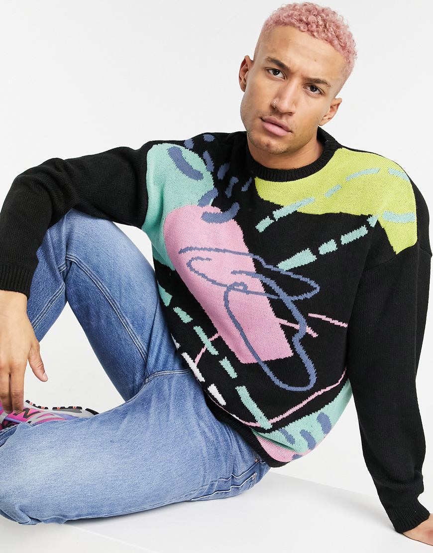 A picture of a male model wearing a 90s-style jumper. Available at ASOS | ASOS Style Feed