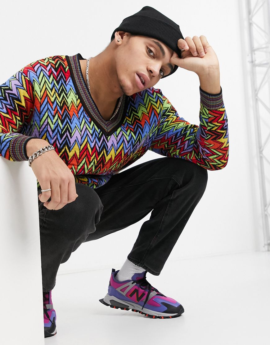 A picture of a model wearing a multi-colour zig-zag design sweater. Available at ASOS | ASOS Style Feed