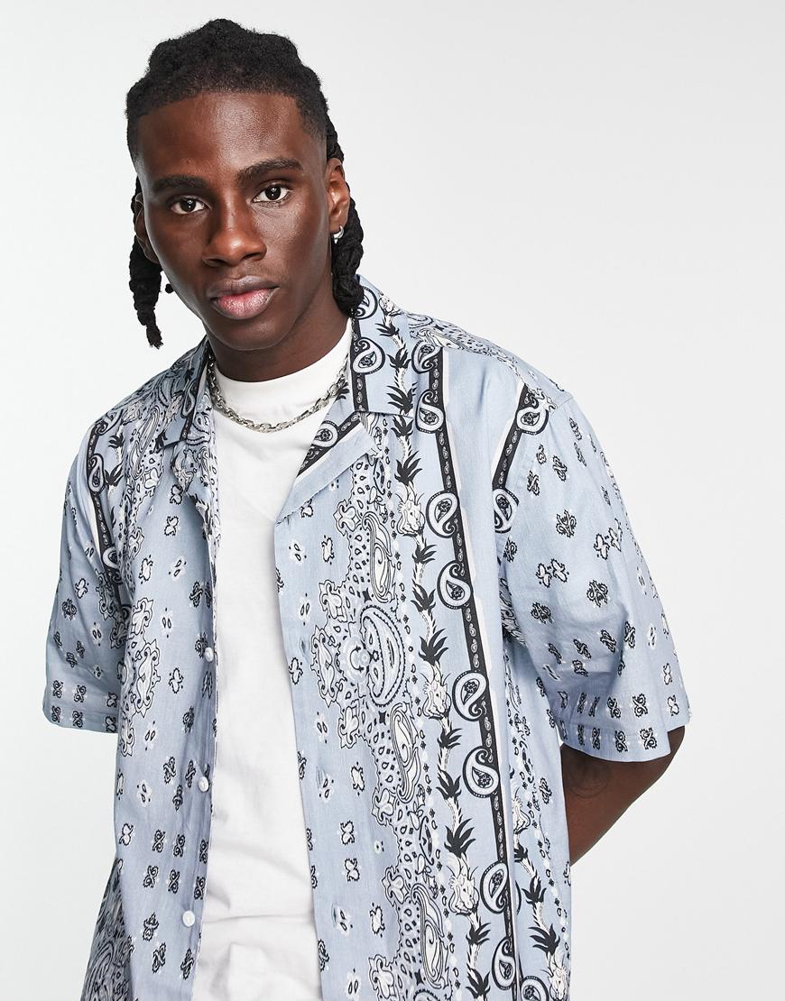 Man in a paisley shirt.