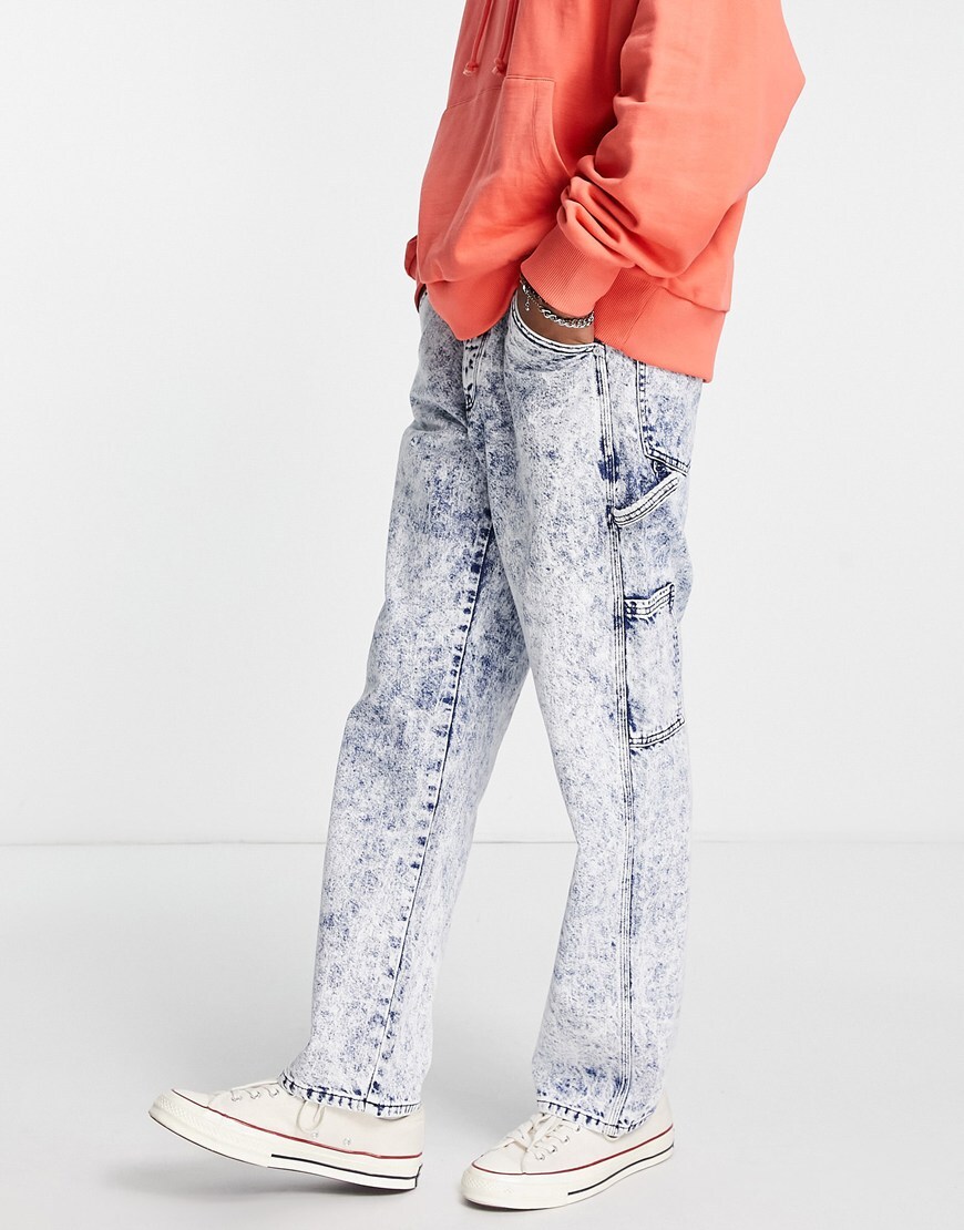 Man in acid-wash jeans.