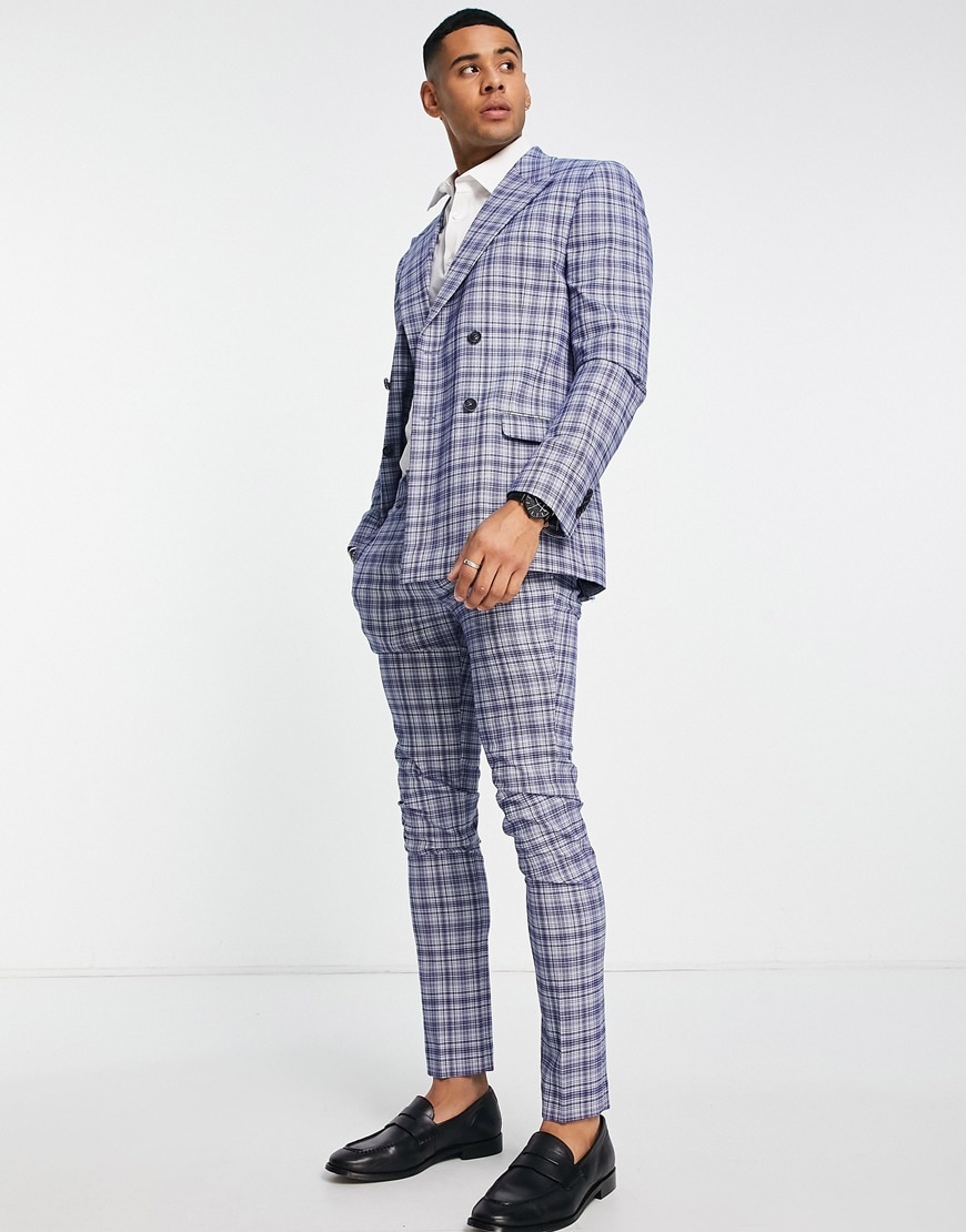 Man wearing a check suit.