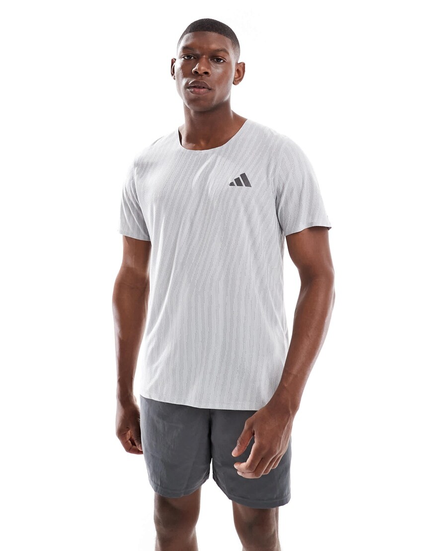 A model wearing an adidas running top | ASOS Style Feed