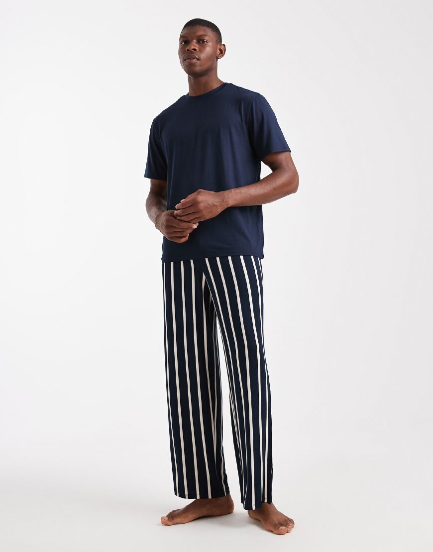 A model wearing navy pyjamas | ASOS Style feed