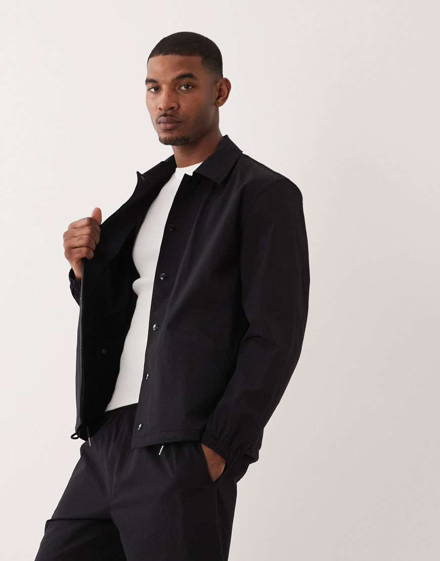 A model wearing a navy shacket | ASOS Style Feed