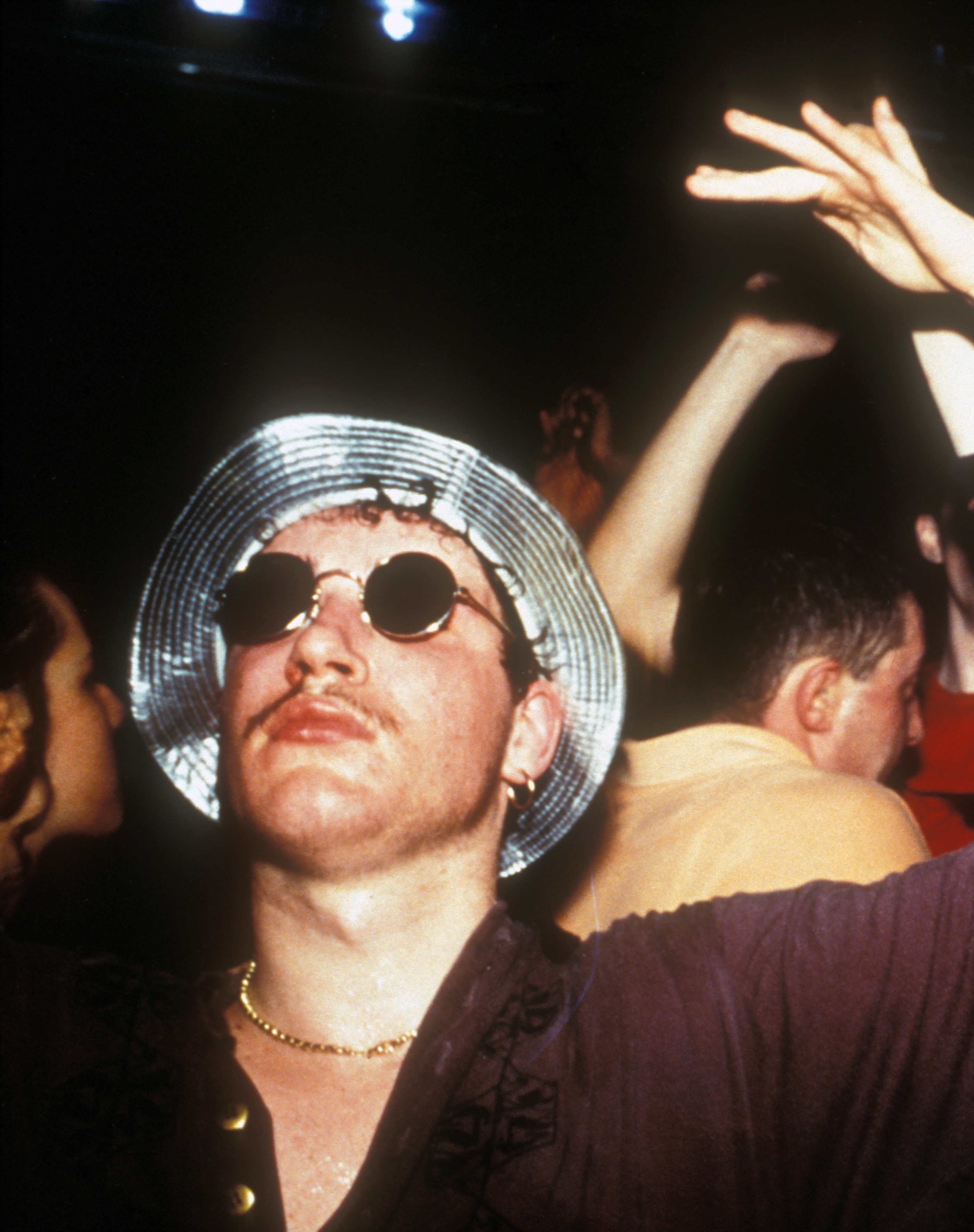 Man wearing a bucket hat at a rave | ASOS Style Feed