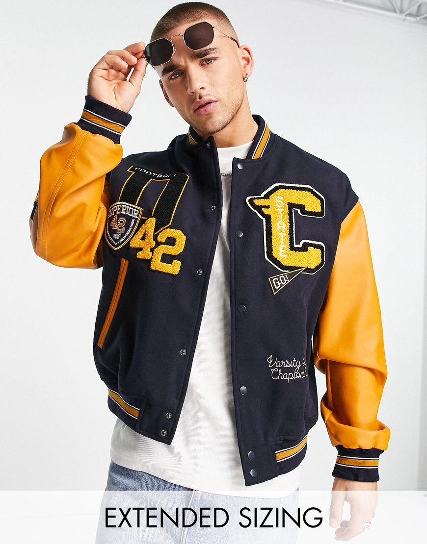 ASOS DESIGN oversized wool look varsity bomber jacket with contrast leather look sleeves in navy | ASOS Style Feed