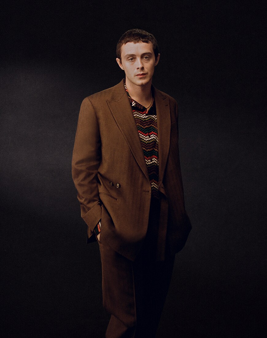 Sonny Hall in brown Topman suit