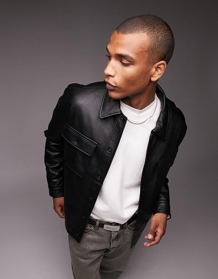 Model in leather shacket and white t-shirt