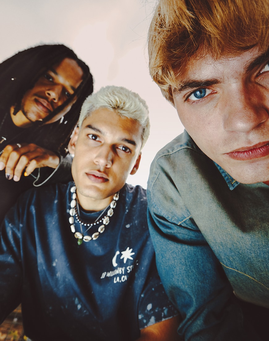 Three men wearing grunge looks