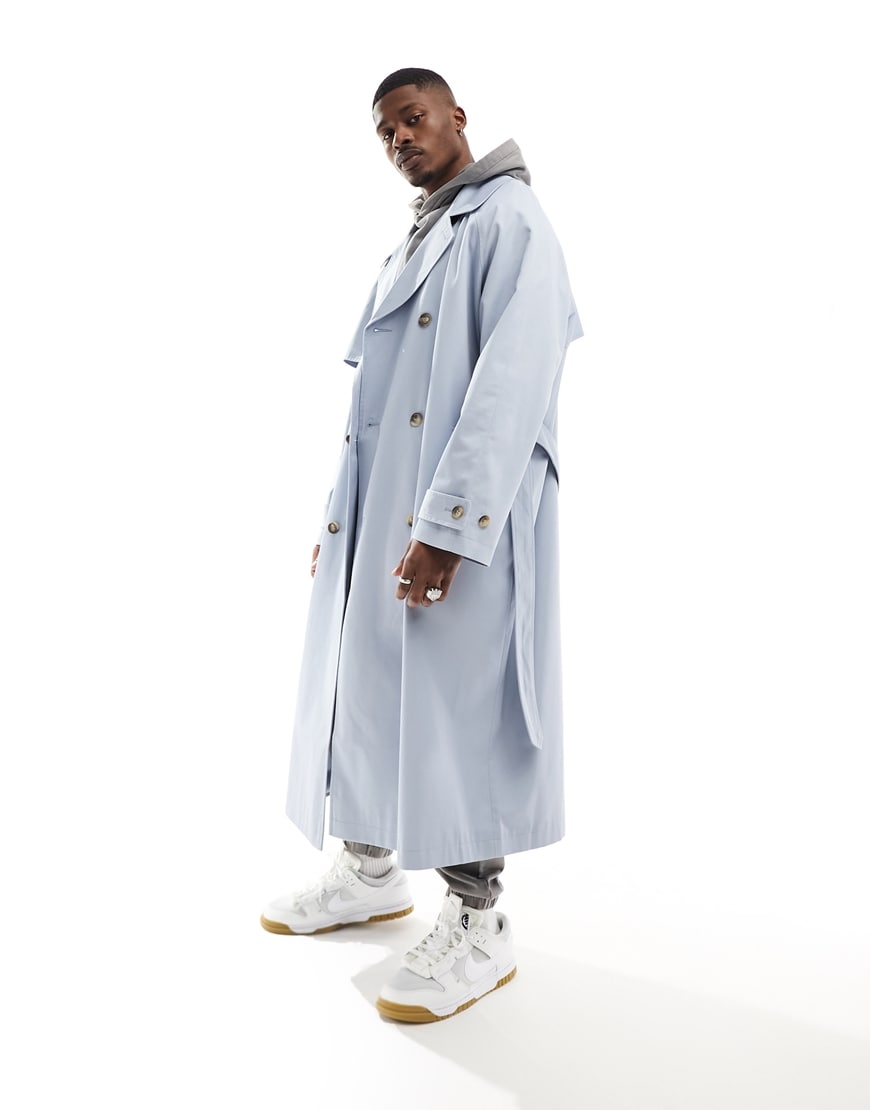 model wearing a blue trench coat