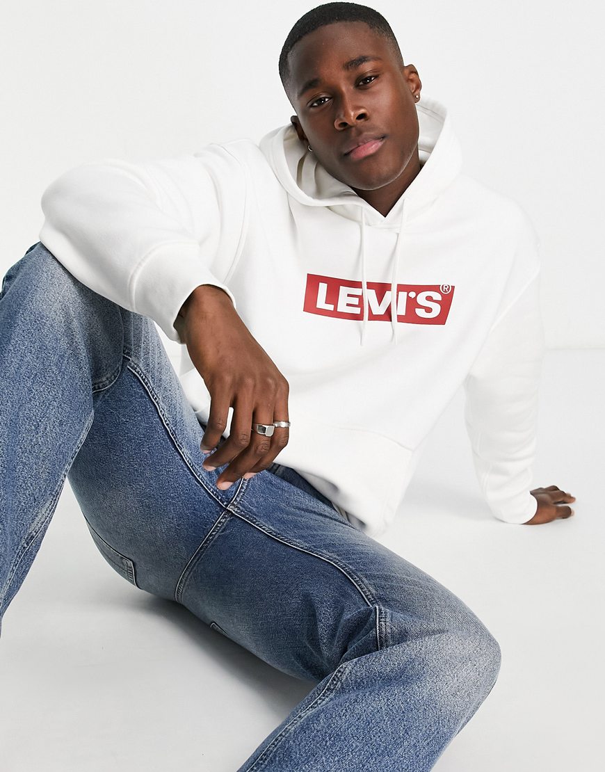 Model in logo hoodie and jeans | ASOS Style Feed