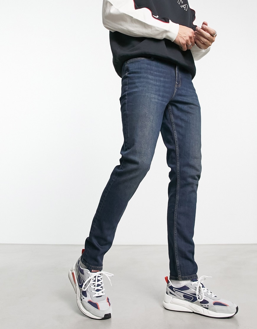 ASOS DESIGN skinny jeans in Y2k tinted dark wash blue