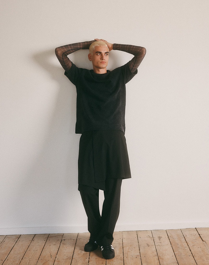 Man wearing baggy T-shirt and plaid long-sleeve top | ASOS Style Feed