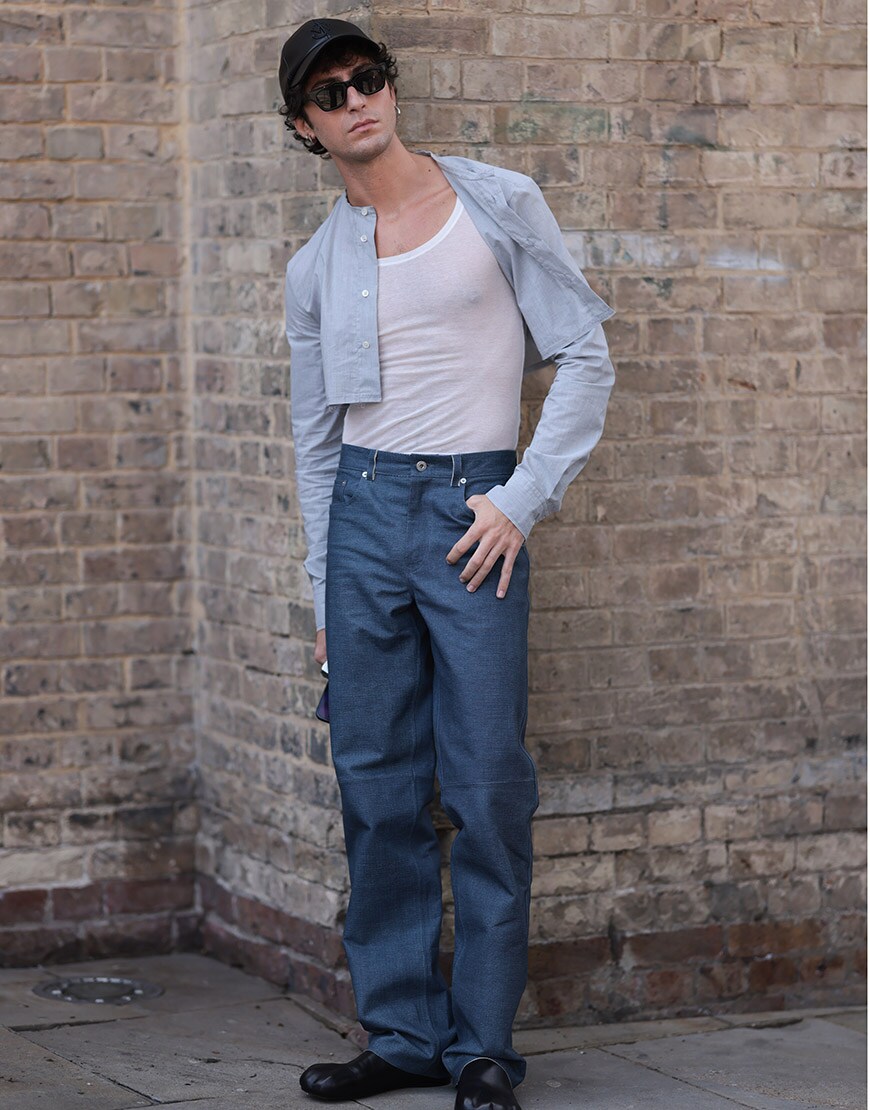 man wearing cropped shirt