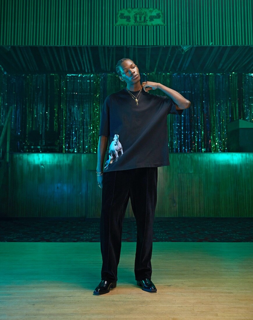 T-shirt and smart trousers
