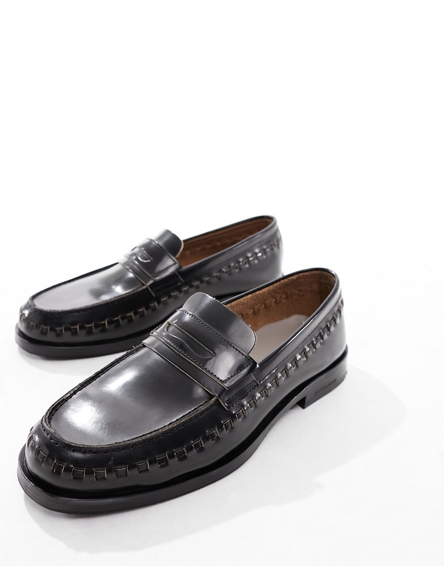 A pair of smart dark-brown loafers