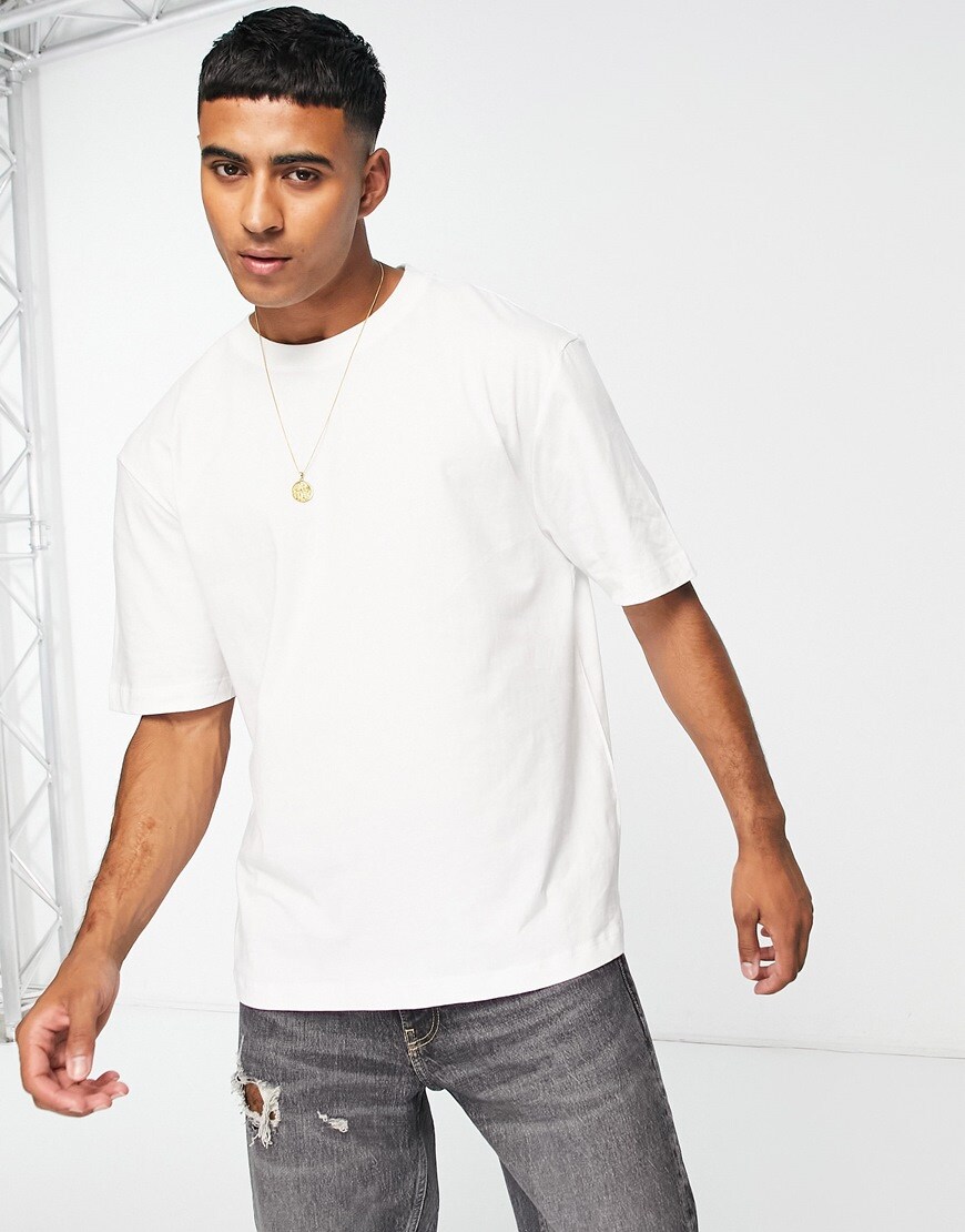 A model wearing a white T-shirt 