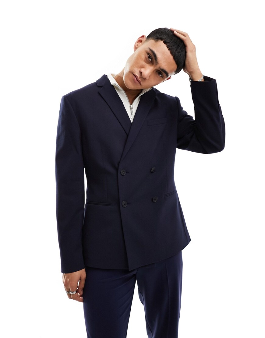 A model wearing a double-breasted suit