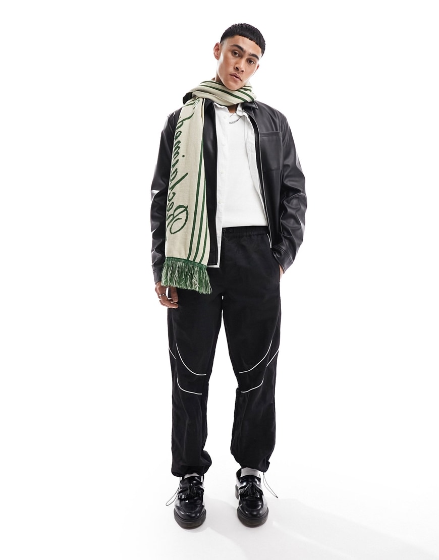 model wearing black joggers