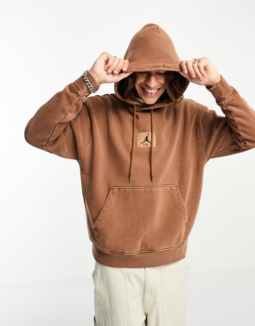 model wearing brown hoody