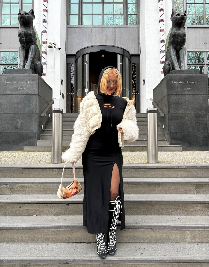 Nicola Morgan in black dress, sunglasses and fur jacket | ASOS Style Feed