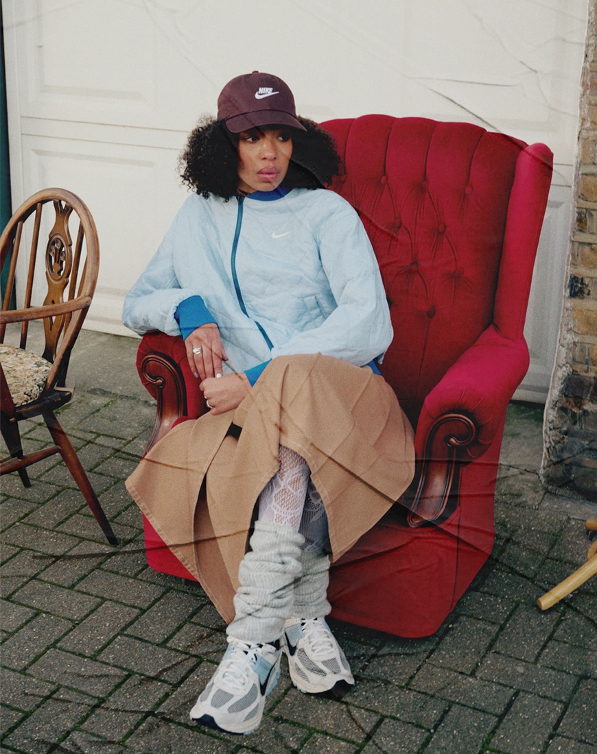 Lola wears the Nike V2K Run unisex trainers in white and fir green |ASOS Style Feed