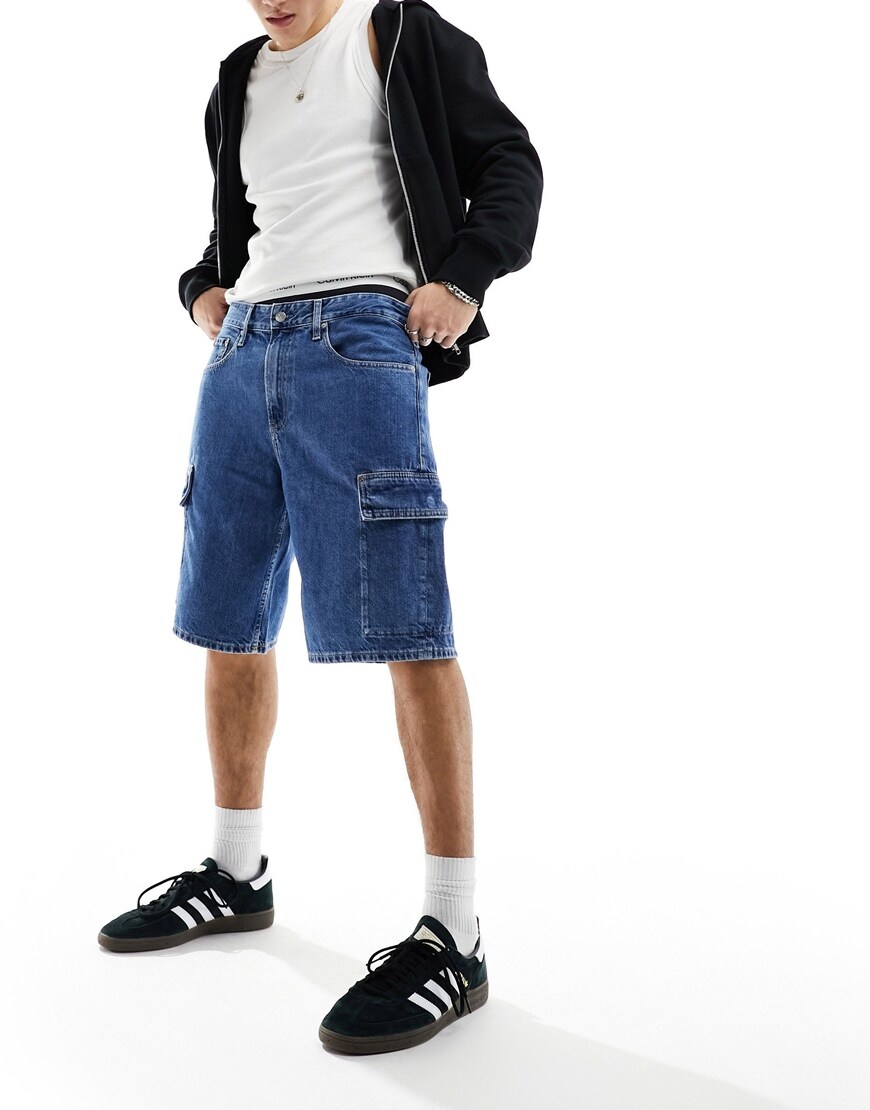 Calvin Klein Jeans 90s loose cargo denim shorts in mid wash | ASOS Style