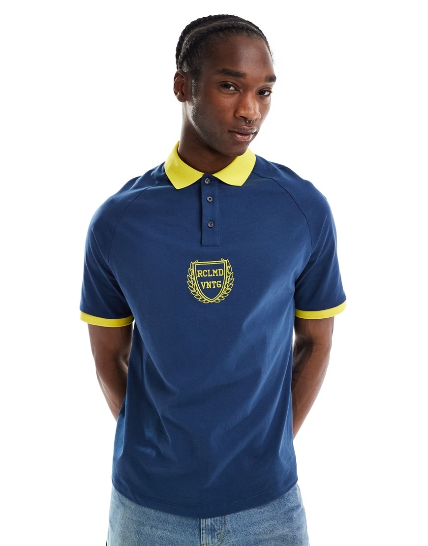 Reclaimed Vintage oversized sports polo top in navy and yellow | ASOS Style Feed