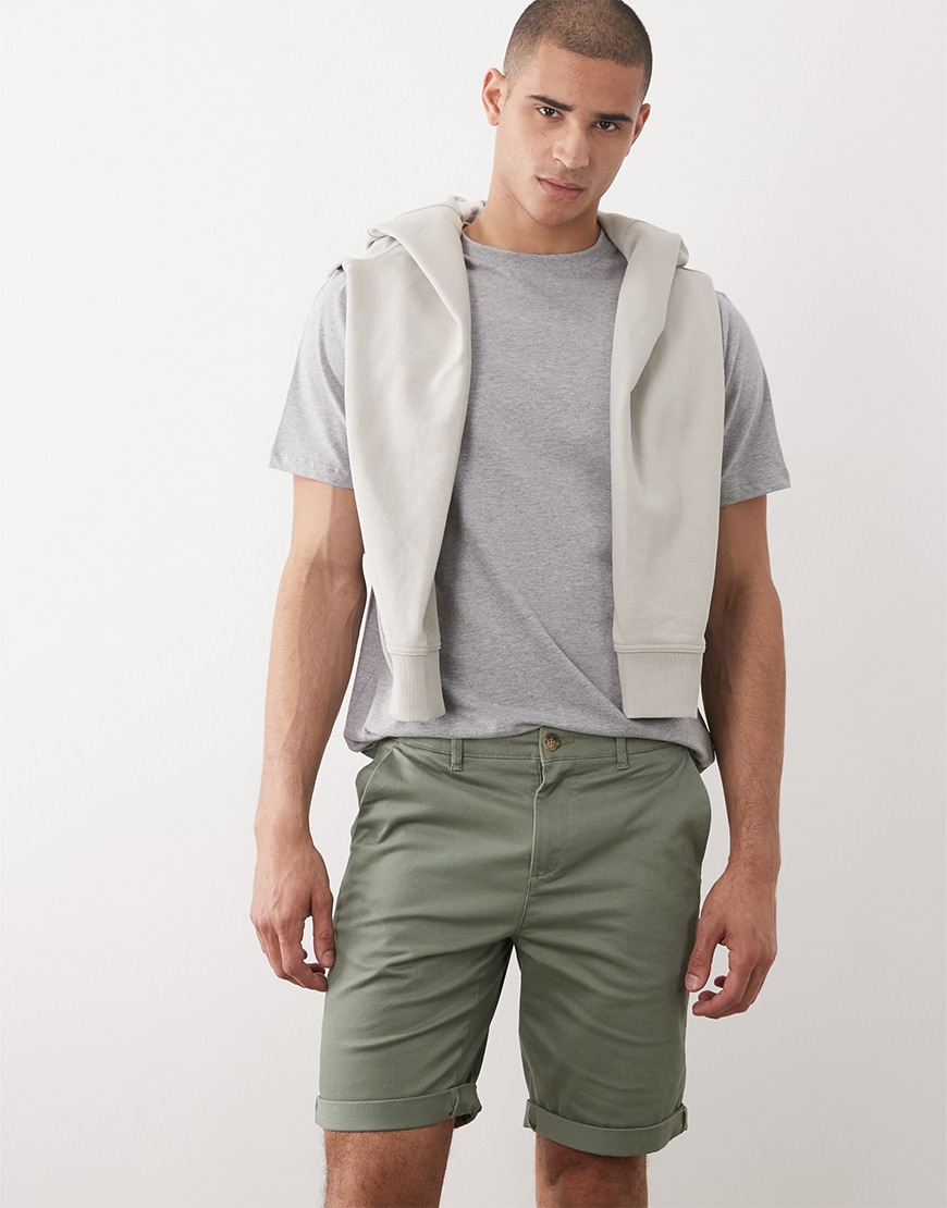 model wearing sage green shorts|ASOS Style Feed