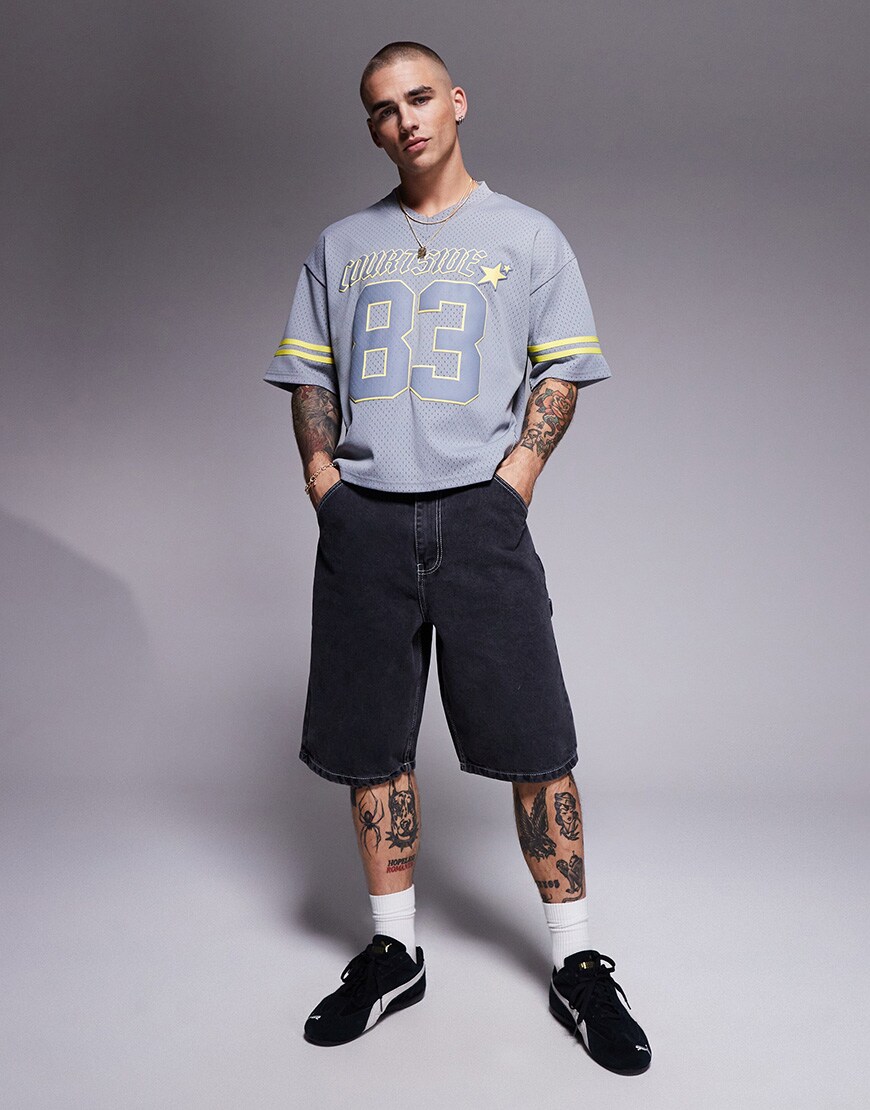 A model wearing black jorts