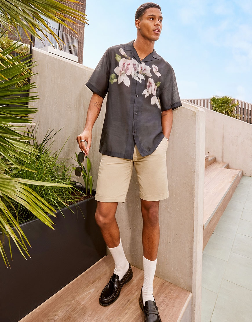 Model wearing floral print shirt with shorts | ASOS Style Feed