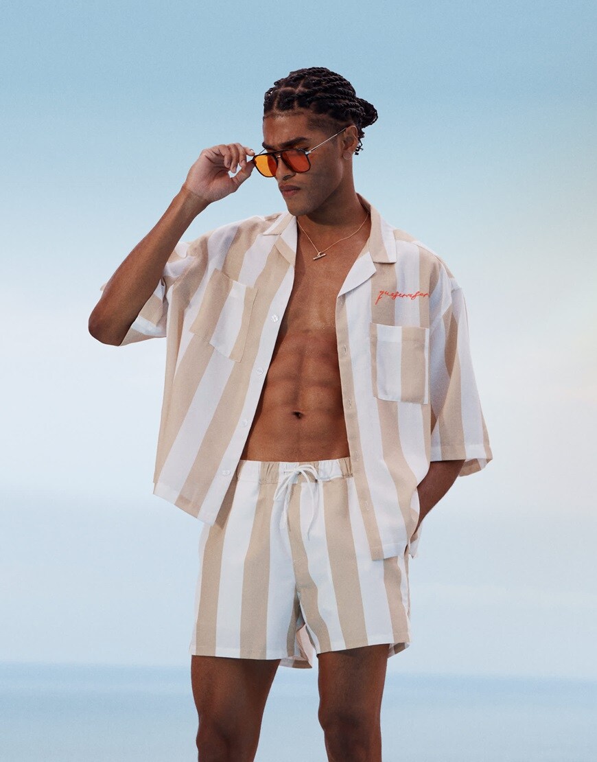 A model wearing a striped co-ord