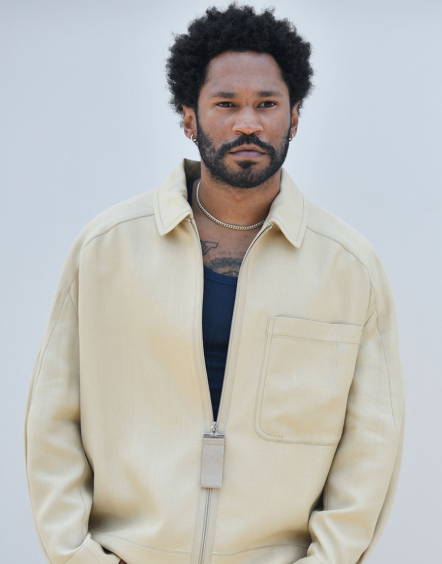 Kaytranada in a cream jacket