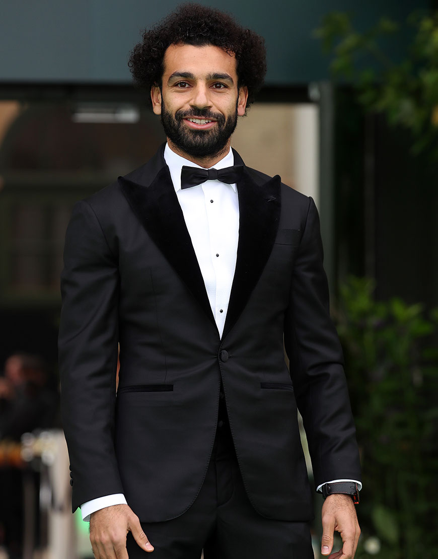 Mo Salah wearing a black tuxedo with bow tie | ASOS Style Feed