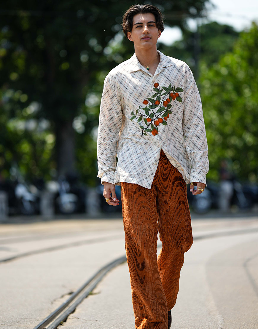 Street styler wearing white to enhance his tan | ASOS Style Feed
