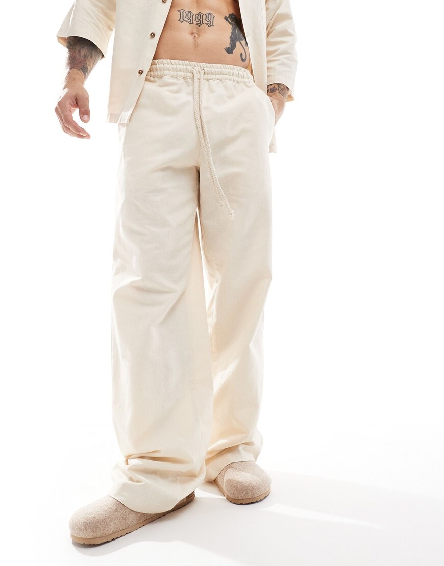 Man wearing wide-leg linen trousers| ASOS Style Feed