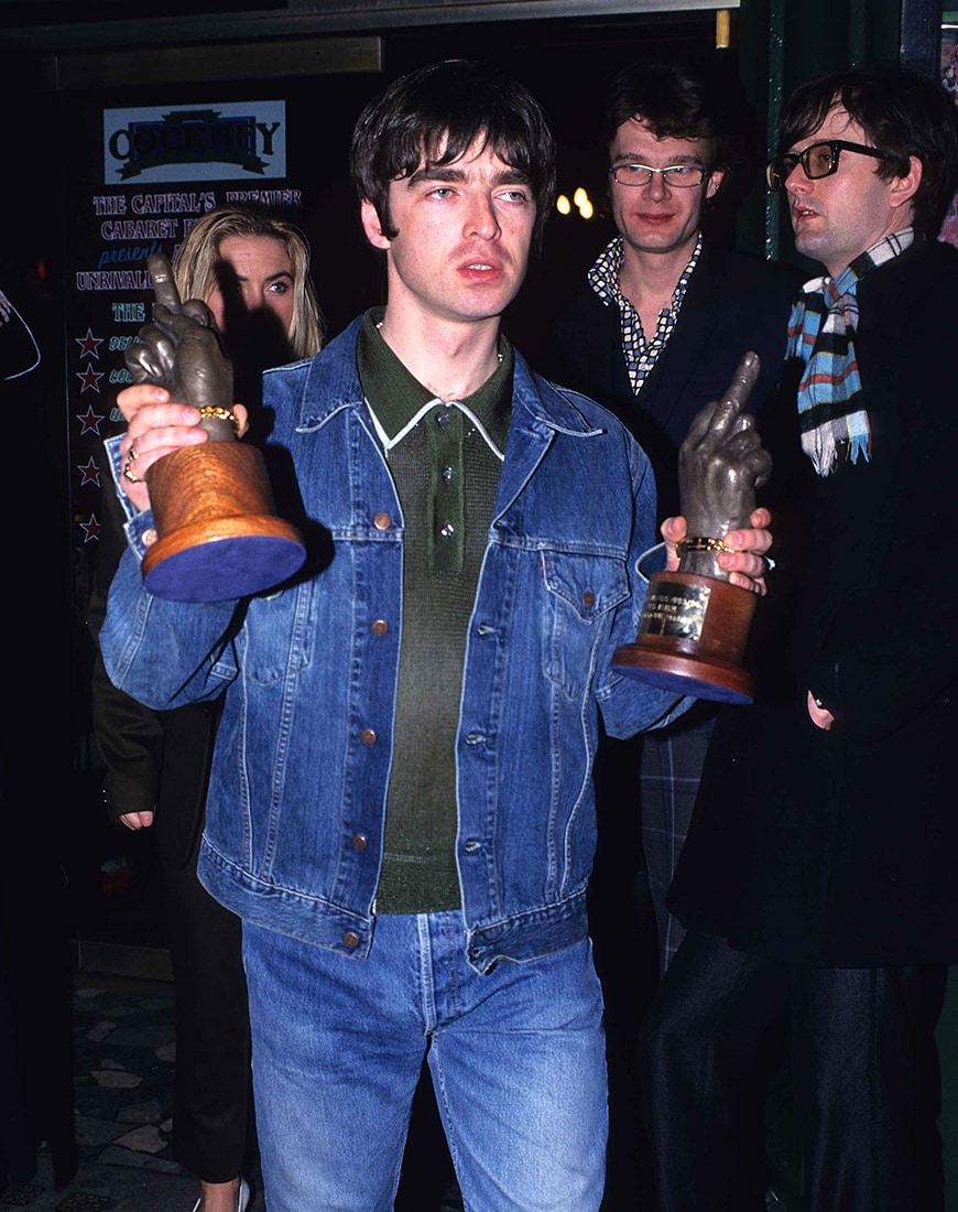 Noel Gallagher wearing a double denim outfit