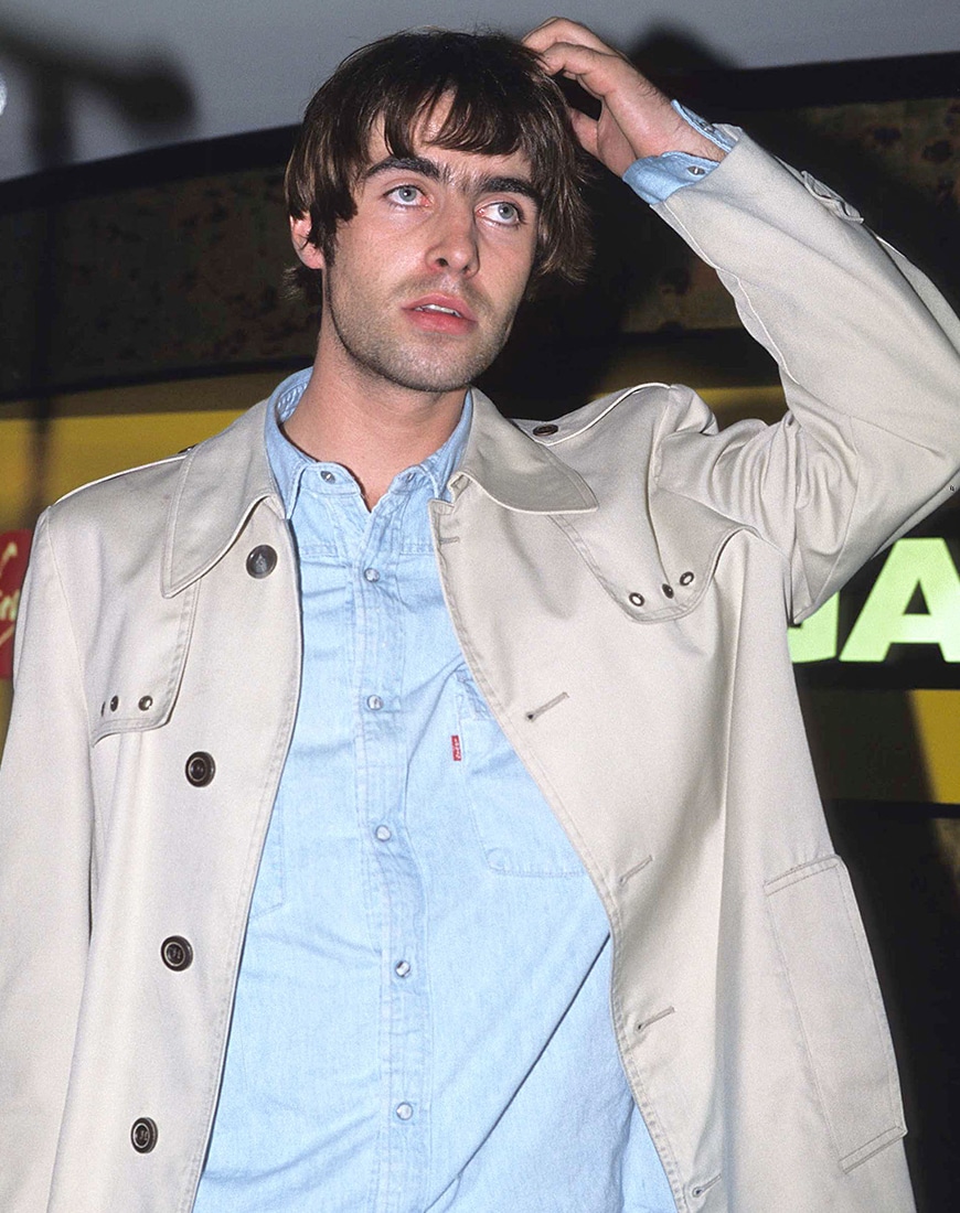Liam Gallagher wearing a beige trench coat