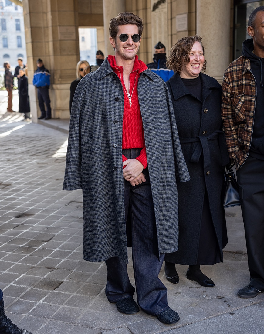 Andrew Garfield wearing grey plaid overcoat with red shirt