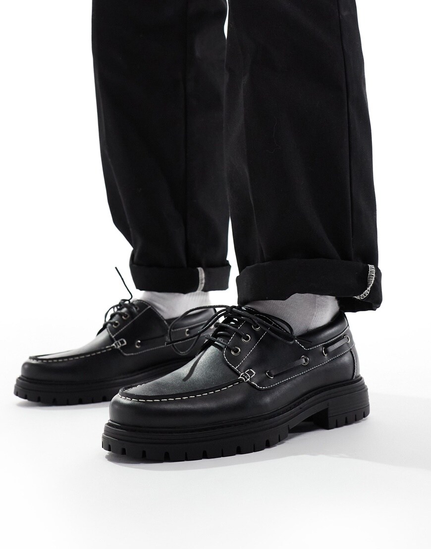 Model wearing chunky lace-up loafers