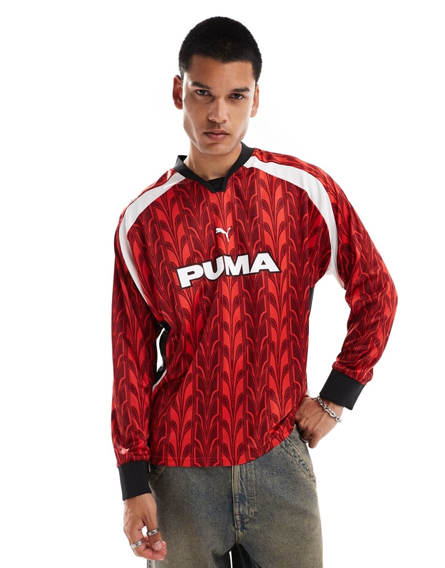 Model wearing red PUMA striped football t shirt