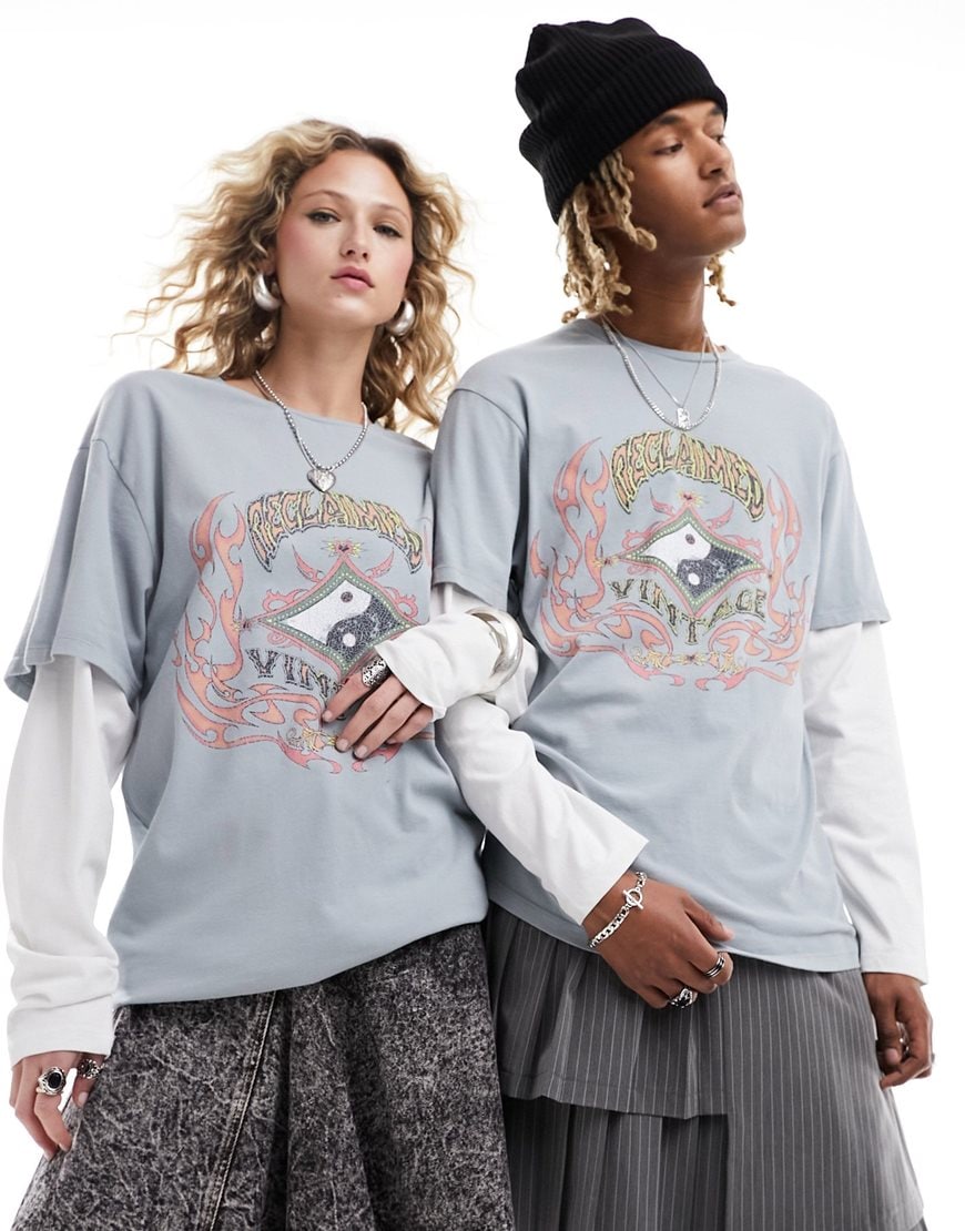 Male and female model wearing sloganeer blue t-shirt that's double-layered with white long-sleeve t-shirt underneath