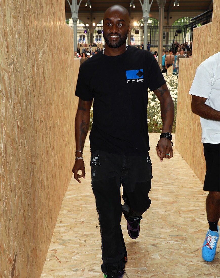 Virgil Abloh in an all-black Off-White outfit backstage at a fashion show