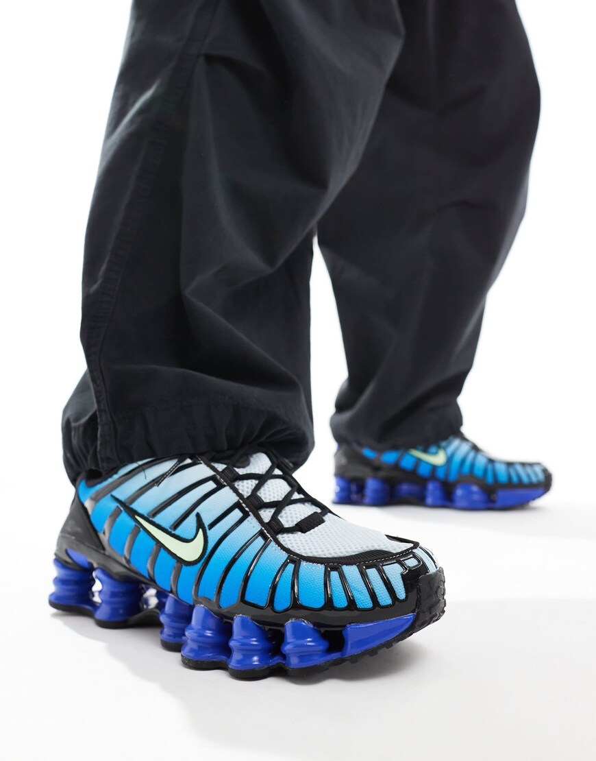 Nike Shox TL trainers in black and bright blue