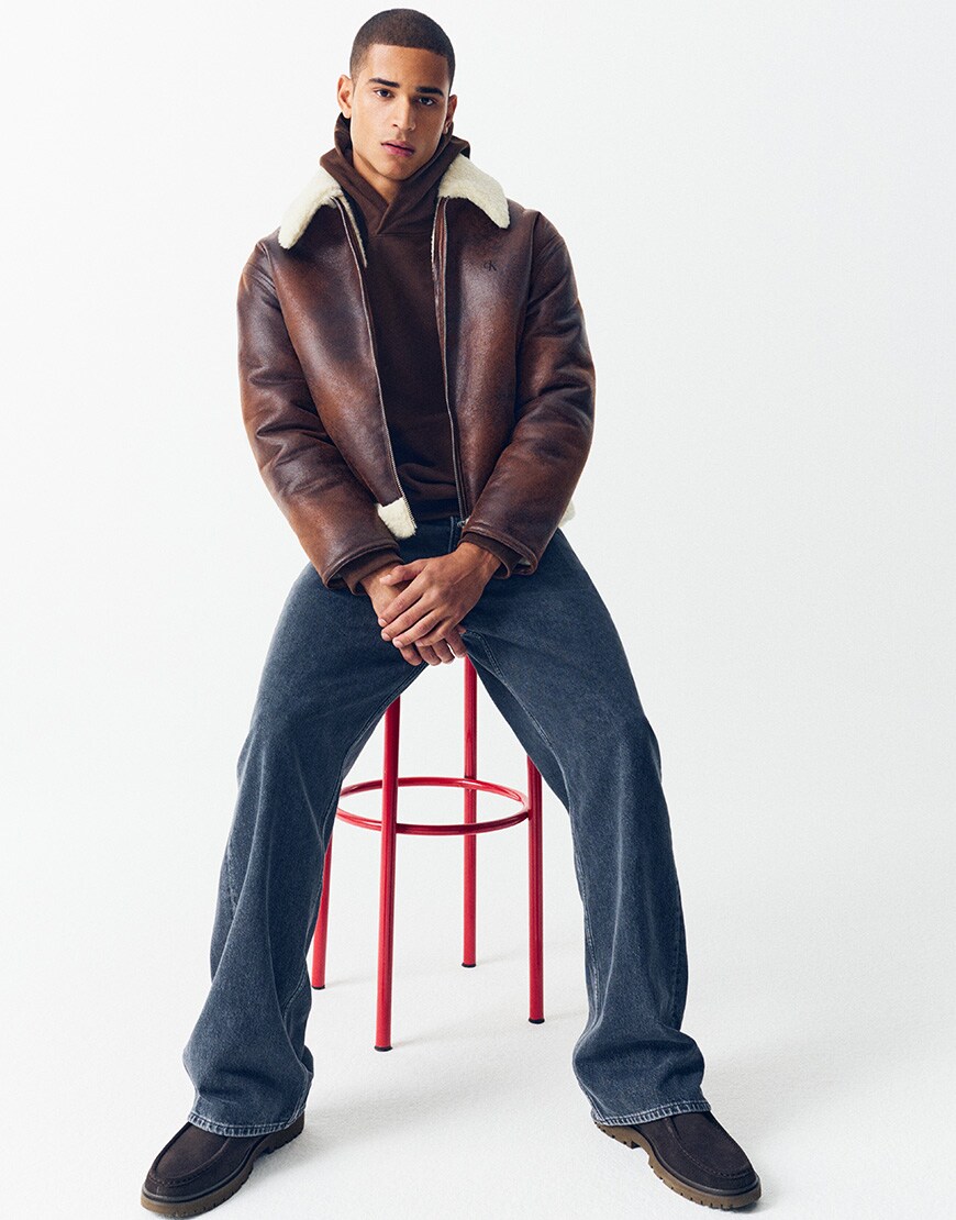 Model wearing aviator jacket, hoodie and jeans from CK Jeans | ASOS Style Feed