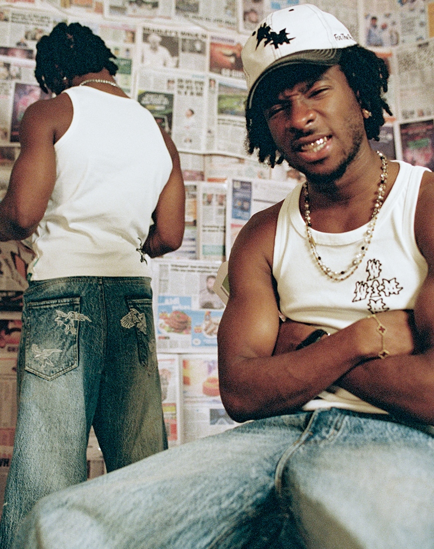 JayO wearing Wall Street Mafia vest