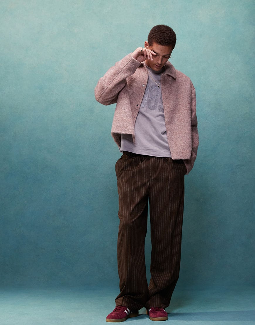 Model wearing pink harrington jacket and striped trousers | ASOS Style Feed